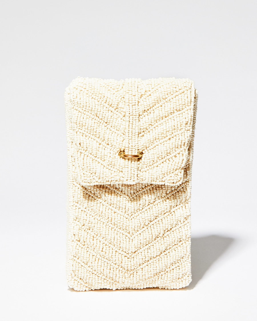 Straight-on studio shot of the Graceful Cascades mini bag, emphasising its minimalist silhouette and slim 3cm depth.