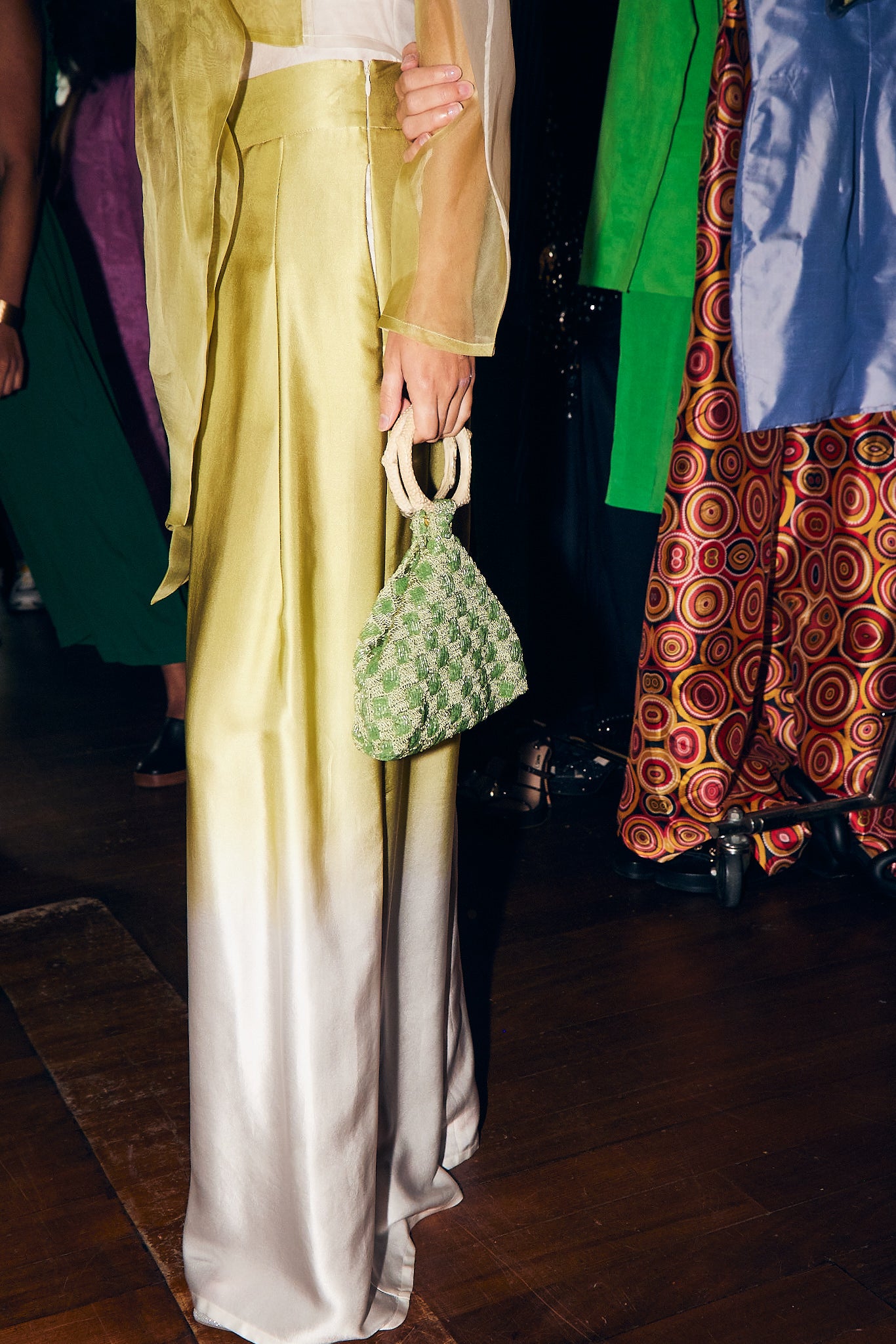 Intimate Exchange beaded bag in sage green, elegant occasion handbag, lifestyle shot