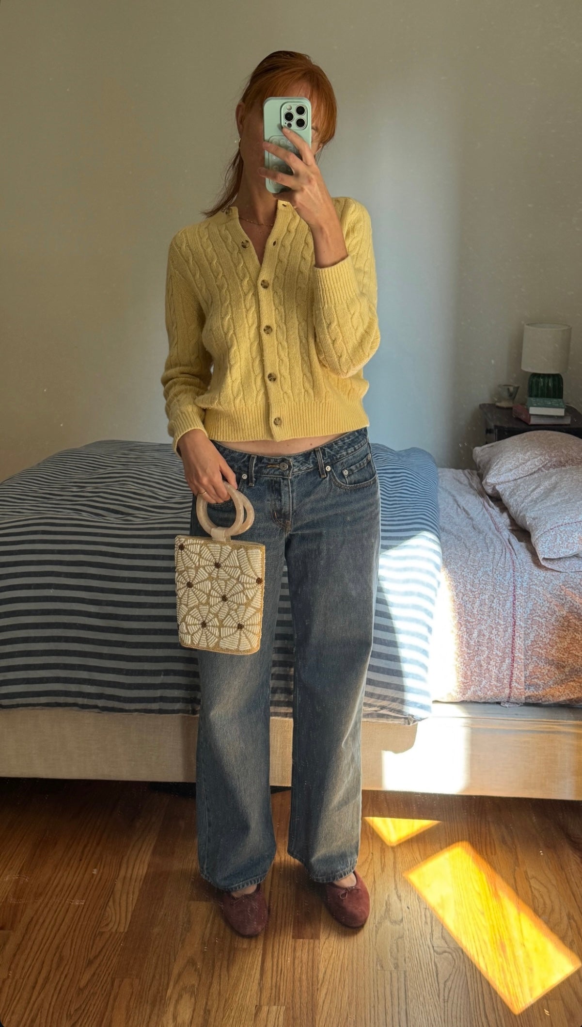 A mirror selfie of a UGC styling the &