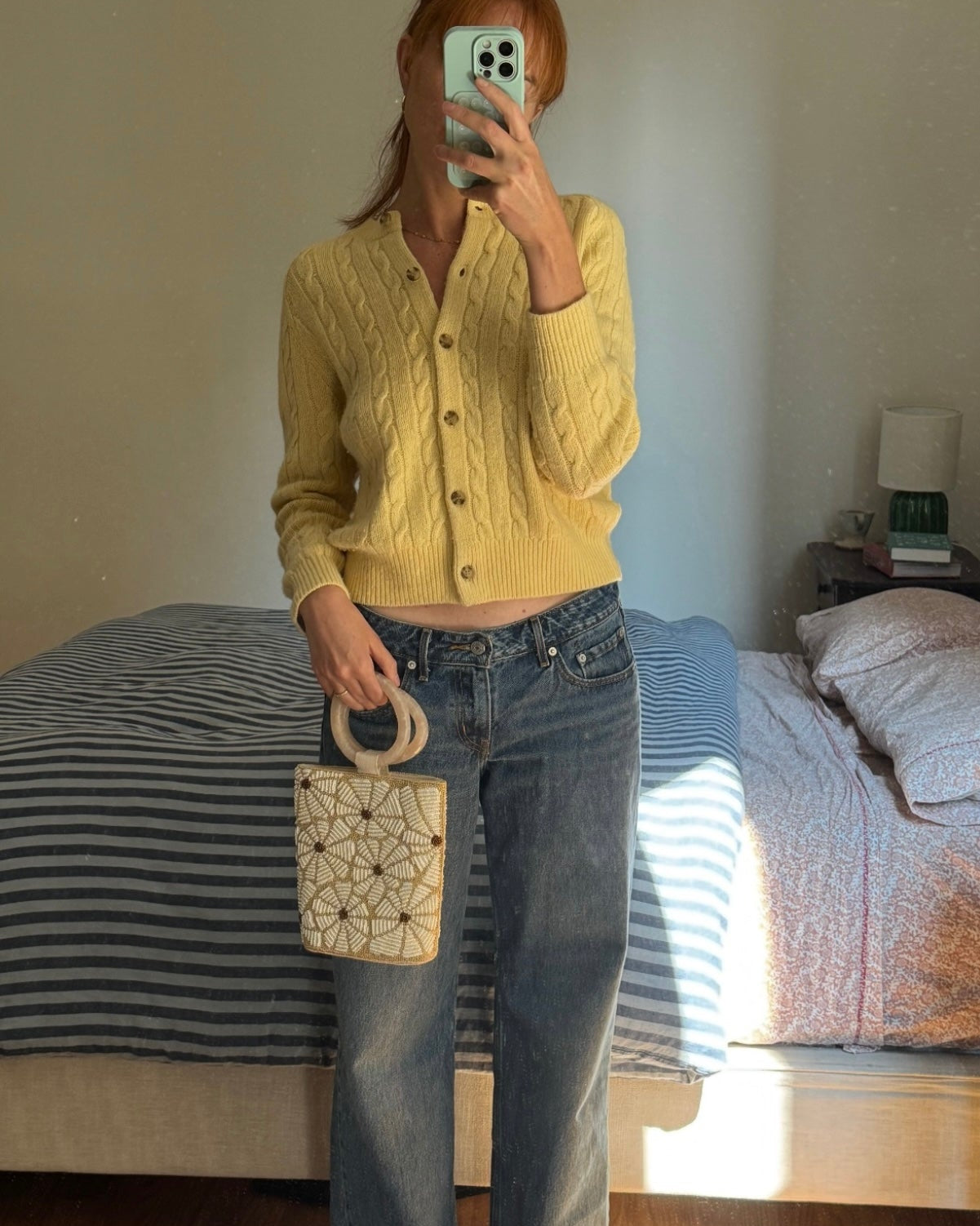 A mirror selfie of a UGC styling the &