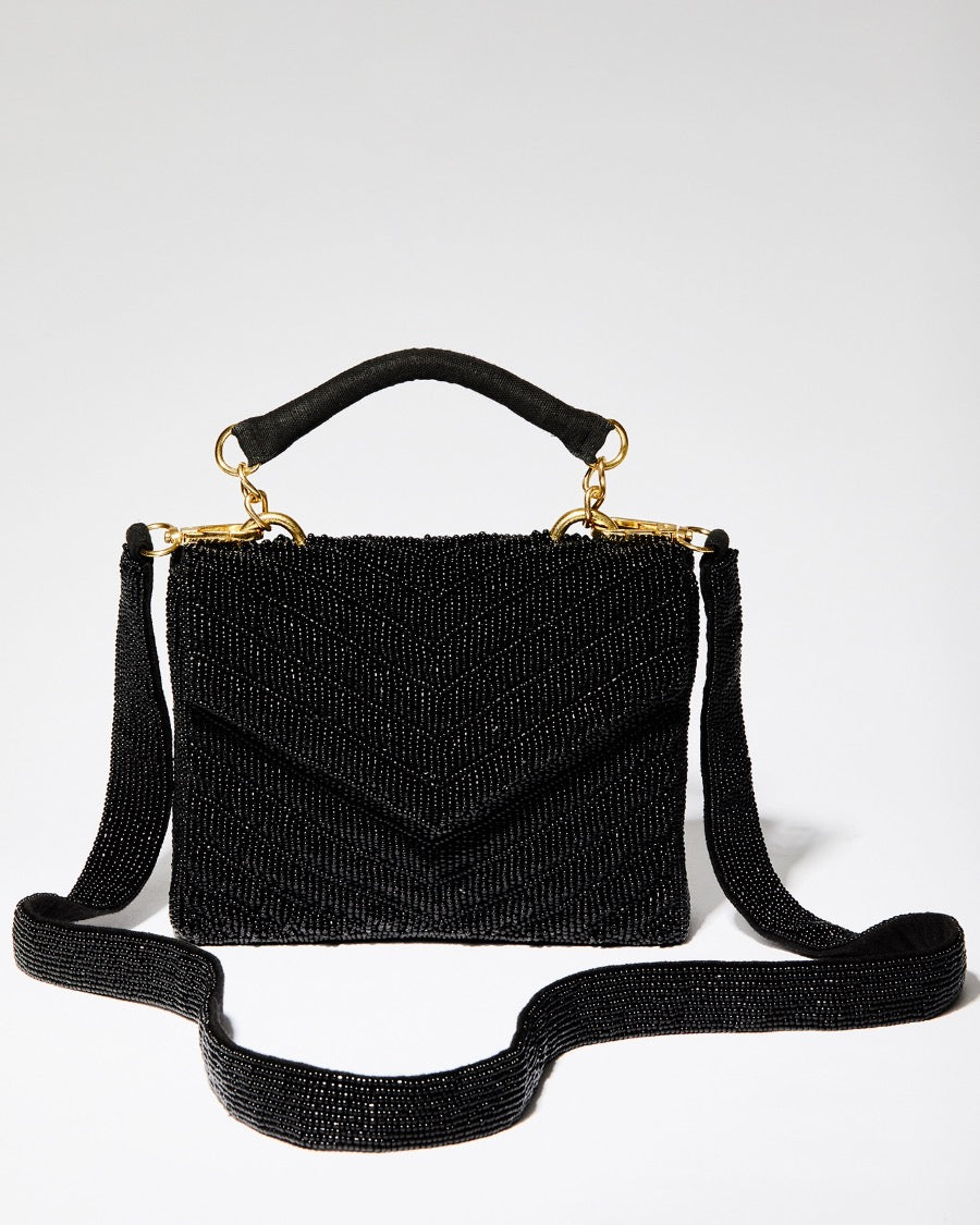 Black beaded chevron bag shown with its detachable 110cm beaded shoulder strap and gold-tone hardware for crossbody wear.