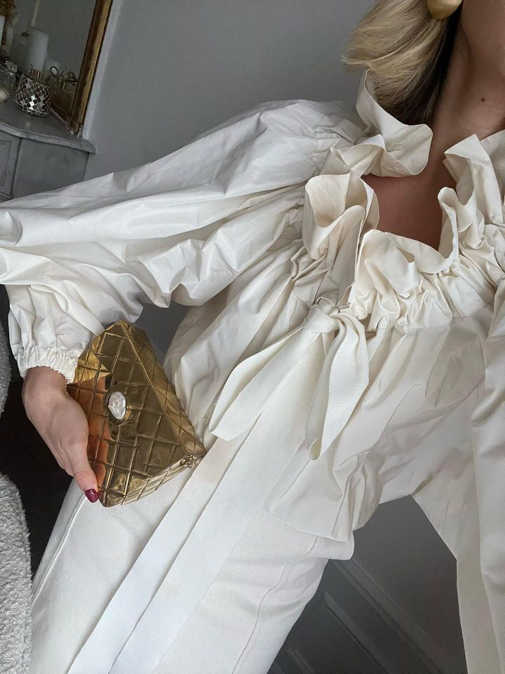 OUR LONGING HANDBAG