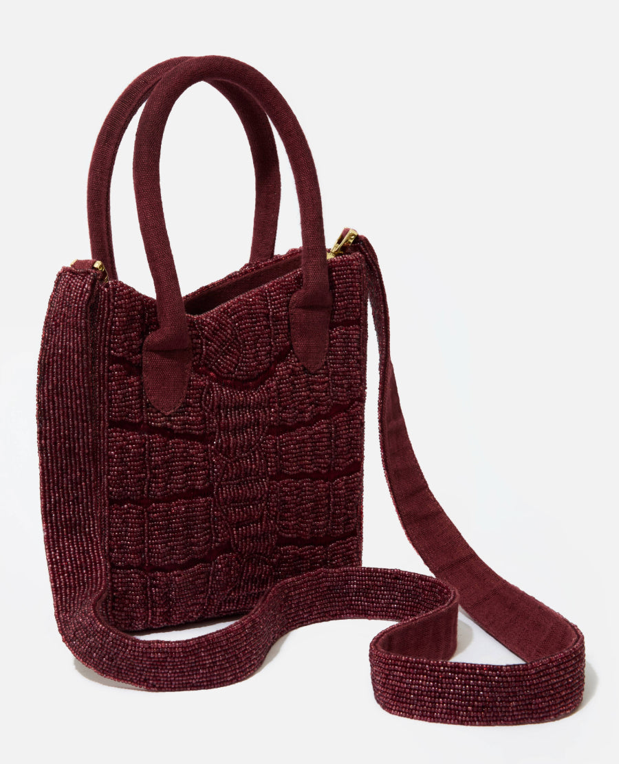Wonder Before Why snake skin pattern beaded bag side view showing shoulder bag strap