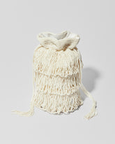 Ivory beaded fringe bag with three layered tassel tiers, gathered drawstring top 