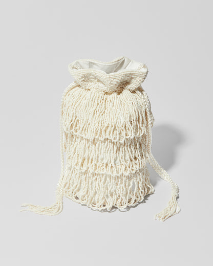 Ivory beaded fringe bag with three layered tassel tiers, gathered drawstring top 
