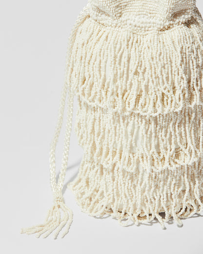 drawstring tassel detail fringe crossbody bag with three layered tassel tiers, gathered drawstring top