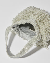 internal view of Mira Silver beaded Tassel bag with layered fringe top strap by the hold 
