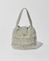 Silver beaded Tassel bag with layered fringe, top strap and beaded flap closure. Front view.