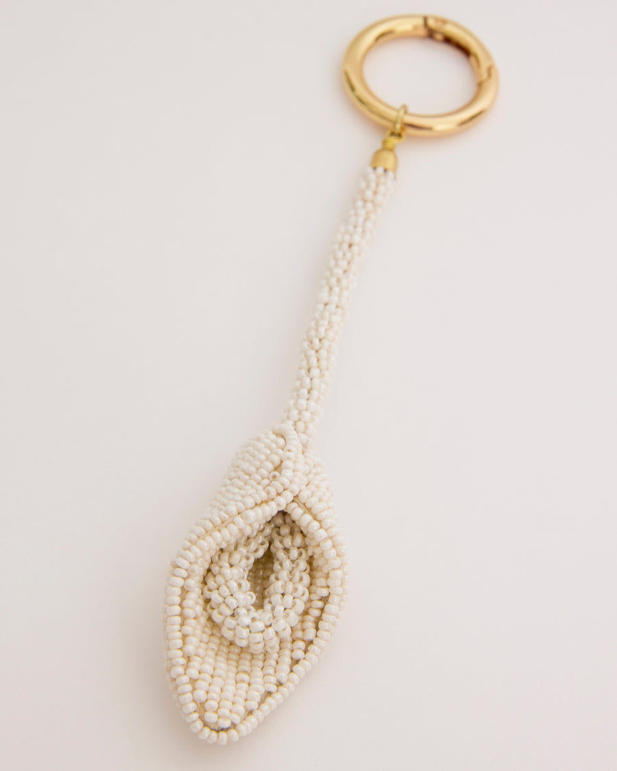 Ivory beaded keychain by The Hold, a sculptural glass bead bag accessory designed in Melbourne.
