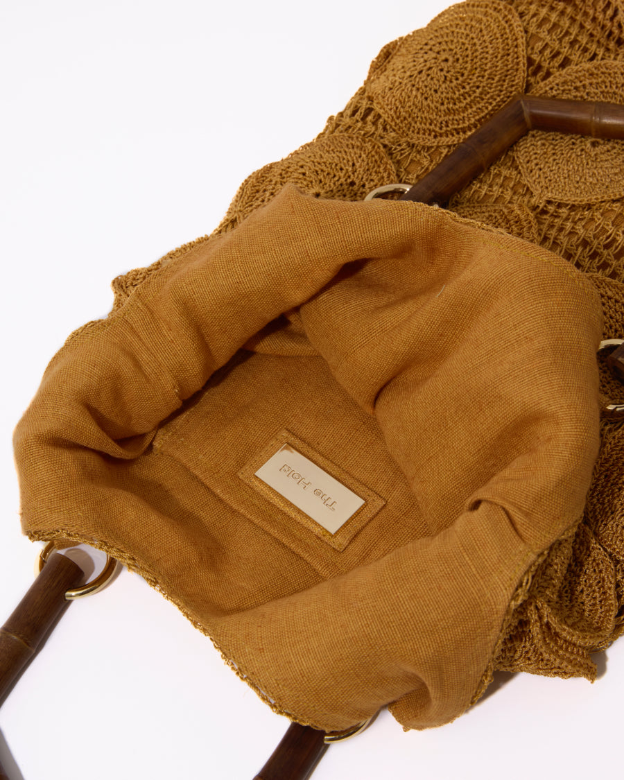 Internal view of the Enveloped Tote showing the spacious natural jute lining and the handcrafted Melbourne design label.