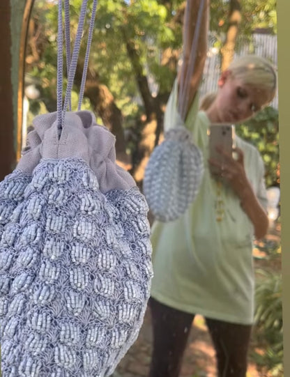 Customer wearing the His Eyes blue beaded bag crossbody et, street style photo