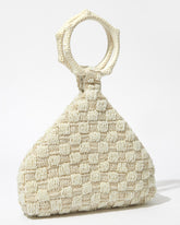 Intimate Exchange ivory beaded handbag, designer statement bag, angled view. Wedding bag with pearl detail 