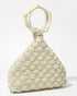 Intimate Exchange ivory beaded handbag, designer statement bag, angled view. Wedding bag with pearl detail 
