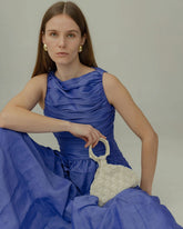 Intimate Exchange bag ivory styled with dress, statement evening handbag