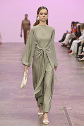 Intimate Exchange ivory beaded bag worn on runway, size reference on model