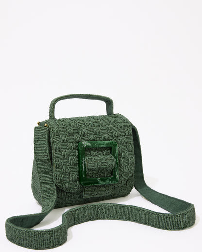 Three-quarter studio view of the Uncovered Layers jade green beaded bag featuring a sculptural woven design and green resin buckle.