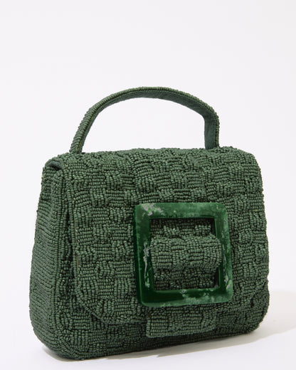 Side profile of the Uncovered Layers jade green bag, highlighting the structured woven layers and secure magnetic closure.