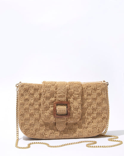 Front view of the Familiar Way bag with its detachable gold crossbody chain, showcasing its clean lines and versatile styling options.