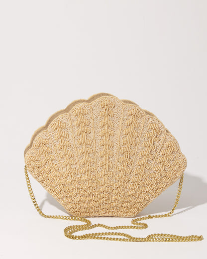Front view of the Stand Still beaded clutch with its detachable gold chain strap, showcasing its transition from clutch to crossbody bag.